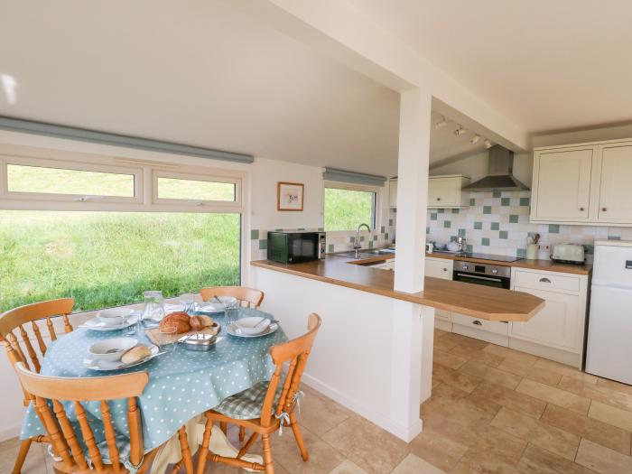 Siesta Chalet in Eype, Dorset. Open-plan living. Coastal location. Sea views. Child-friendly. 2-bed.