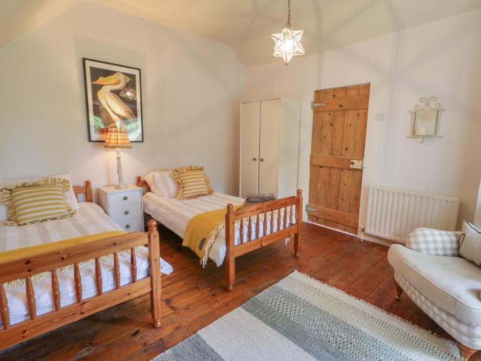 The Old Rectory Coach House, Rathmullan, County Donegal. Three-bedroom home with pretty garden. Pets