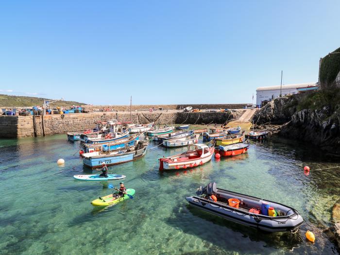 The Mariners in Coverack, Cornwall. Two-bedroom, reverse-level home, enjoying sea views. Near beach.