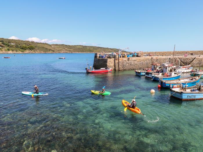 The Mariners in Coverack, Cornwall. Two-bedroom, reverse-level home, enjoying sea views. Near beach.