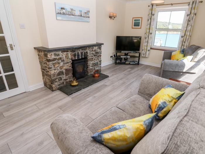 The Mariners in Coverack, Cornwall. Two-bedroom, reverse-level home, enjoying sea views. Near beach.