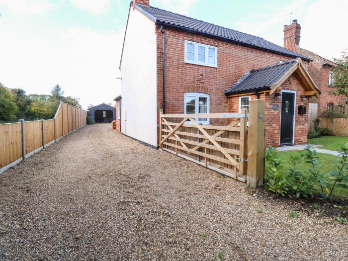 Well Cottage, is near Loddon, Norfolk. Four-bedroom home with enclosed garden and woodburning stove.