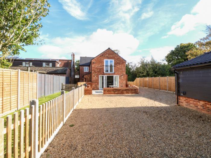 Well Cottage, is near Loddon, Norfolk. Four-bedroom home with enclosed garden and woodburning stove.