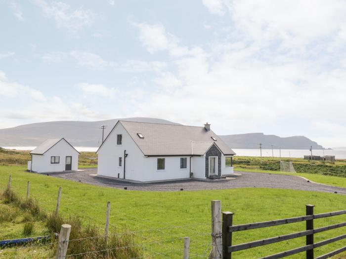 Purteen is in Keel, in County Mayo. Rural and sea views. Three-bedroom, stylish home. Near the beach
