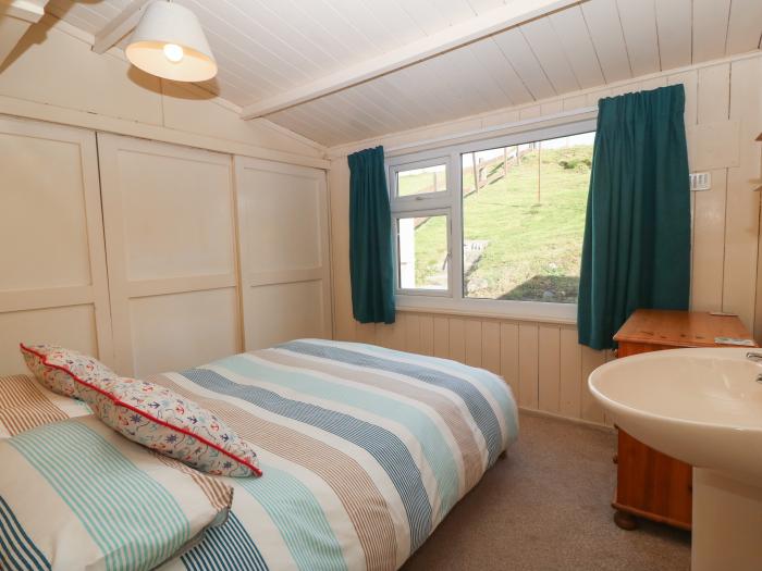 Niwl-y-Mynydd near Clynnog Fawr, Gwynedd. Three-bedroom bungalow with sea views. Near a beach. Pets.
