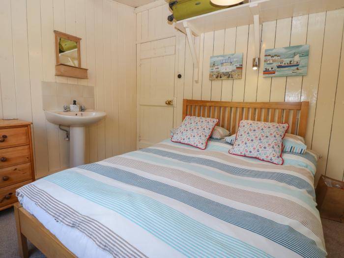 Niwl-y-Mynydd near Clynnog Fawr, Gwynedd. Three-bedroom bungalow with sea views. Near a beach. Pets.