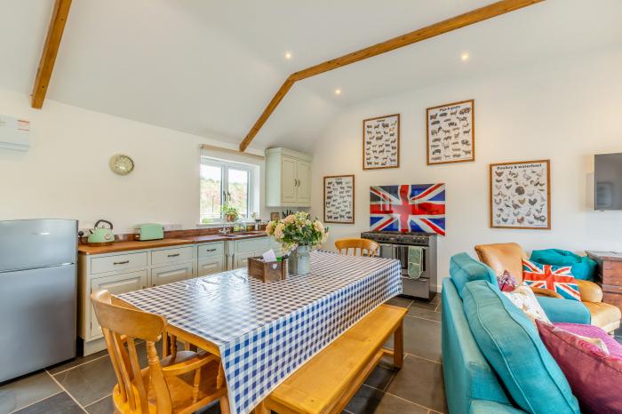 The Farm Office, Bampton, Devon. 17th century. Hay Barn. Two bedrooms. Private valley. Pet-friendly.