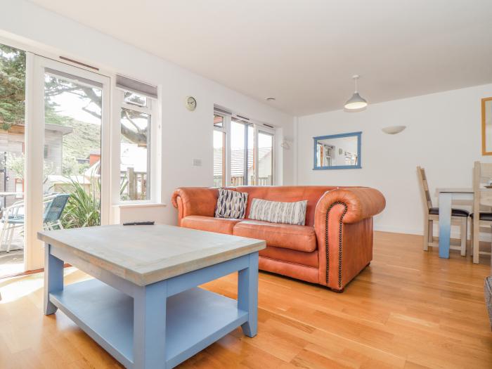 Tehidy in Porthtowan, Cornwall. Three bedrooms. Pet-friendly. Beach close. Hot tub. Off-road parking