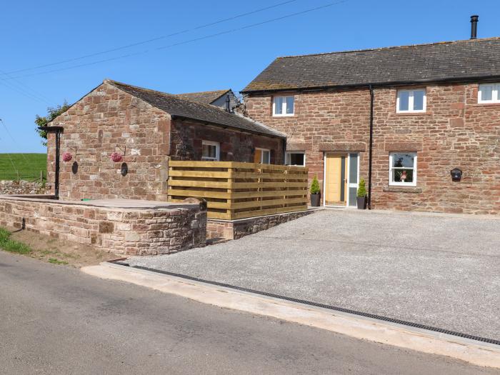 The Granary, Allerby, Cumbria. Three bedrooms. Off-road parking. Patio with furniture. Electric fire