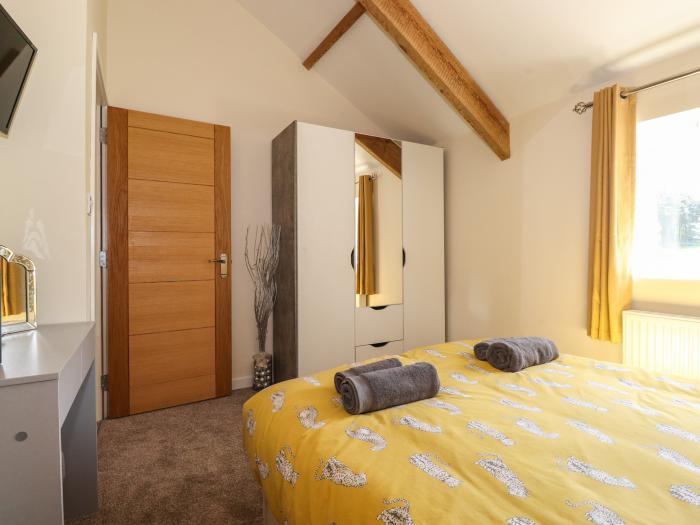 The Granary, Allerby, Cumbria. Three bedrooms. Off-road parking. Patio with furniture. Electric fire