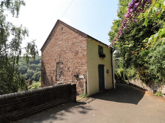 The Olde Drill House in Ironbridge, Shropshire. Two-bedroom, riverside home. Close to shops and pubs