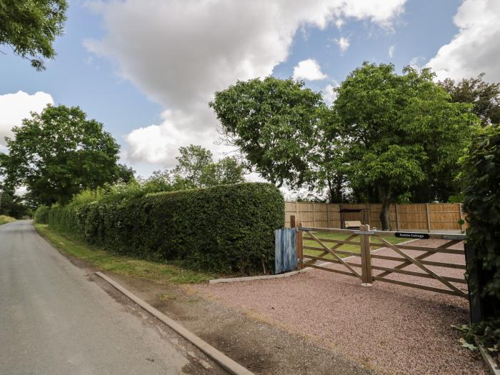 Avoine Cottage near Hartpury, Gloucestershire. Two-bedroom cottage with pet-friendly garden. By AONB