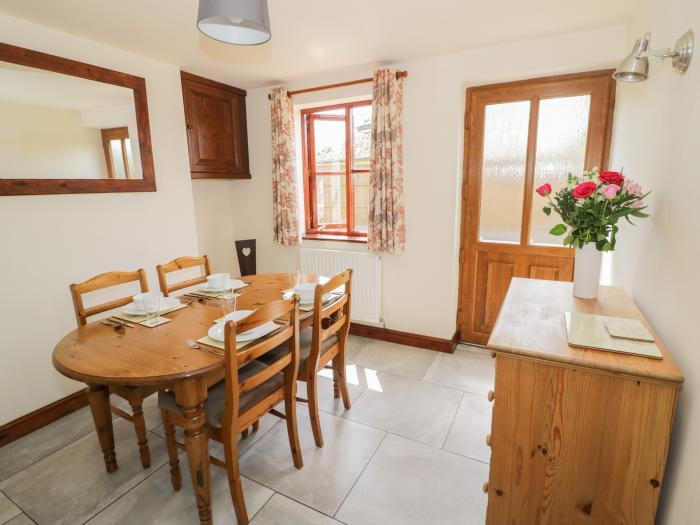 Avoine Cottage near Hartpury, Gloucestershire. Two-bedroom cottage with pet-friendly garden. By AONB