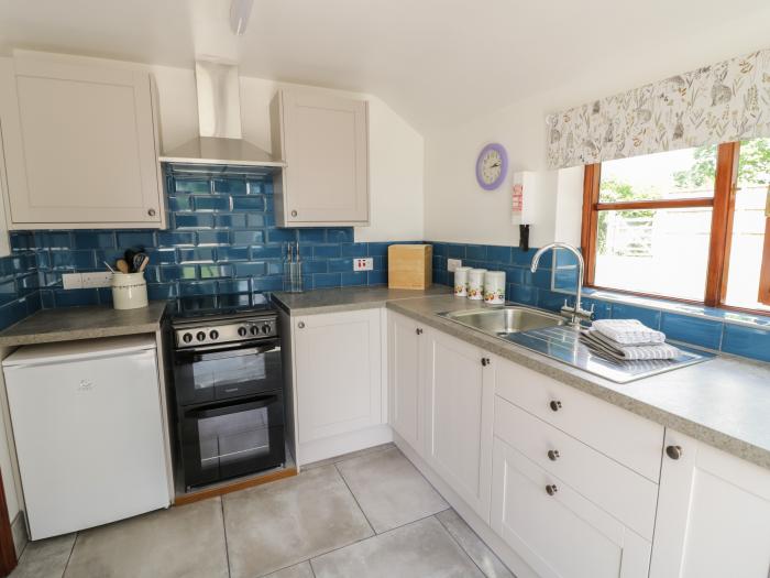 Avoine Cottage near Hartpury, Gloucestershire. Two-bedroom cottage with pet-friendly garden. By AONB