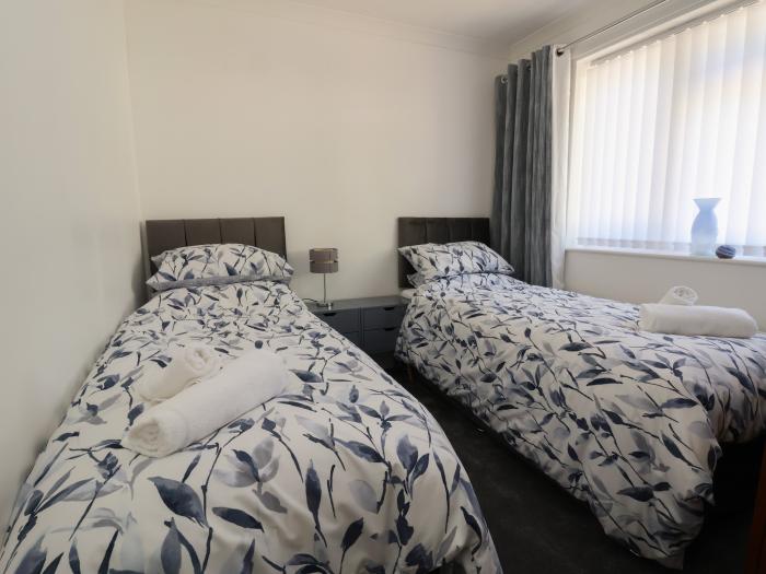 Cock Bank Cottage is near Bangor-On-Dee, Wrexham. Two-bedroom bungalow resting rurally. Pet-friendly