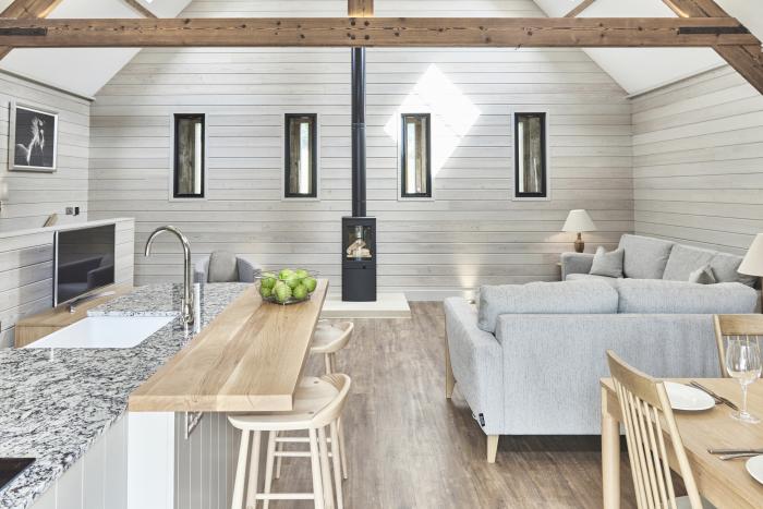 The Hayloft in Humshaugh, Northumberland. Two-bedroom apartment with access to on-site spa. Stylish.