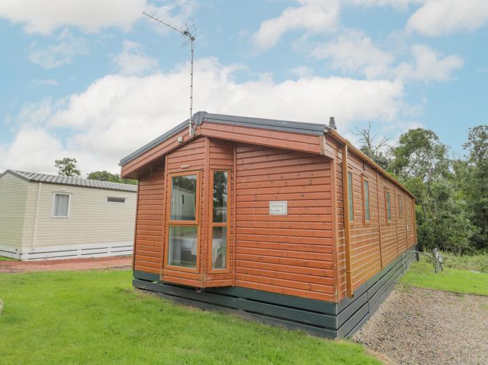 Mulberry lodge, in Felton, Northumberland. Three-bedroom lodge with wrap-around decking and hot tub.