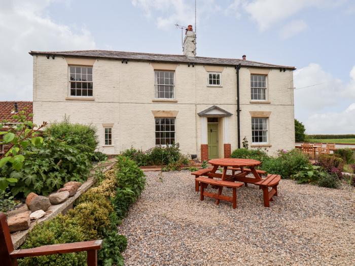 Old Mill House is in Bempton, in East Yorkshire. Four-bedroom, traditional cottage with rural views.
