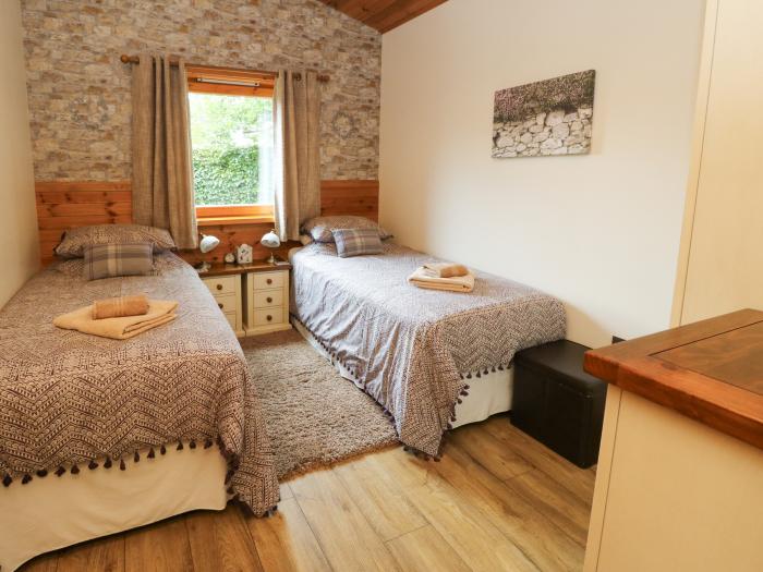 Burnside Lodge nr Fort William, Western Highlands. Log cabin. Private sauna. Decking. Wooden. 2-bed.