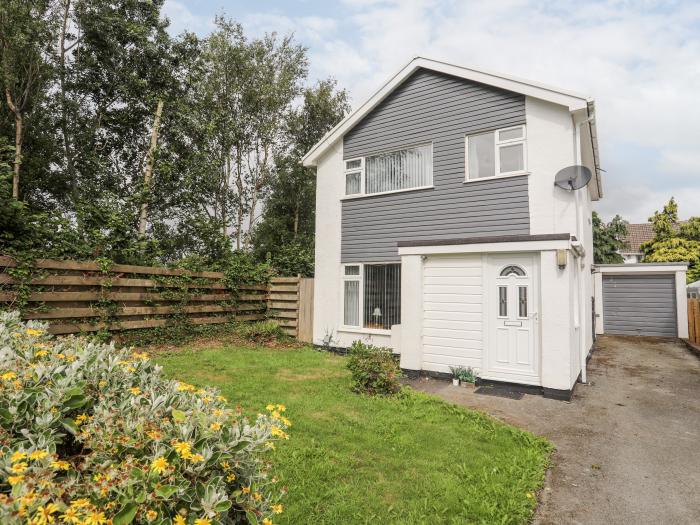 58 Mill Bank is in Llandegfan, Anglesey. Close to amenities. Near a National Park. Off-road parking.