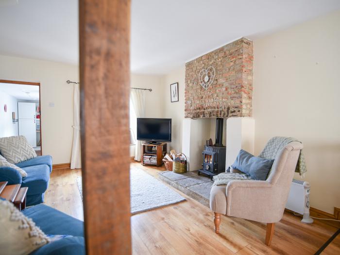 Heron Cottage, in Colyton, East Devon. Near an AONB. Smart TV. Woodburning stove. Pet-friendly. WiFi