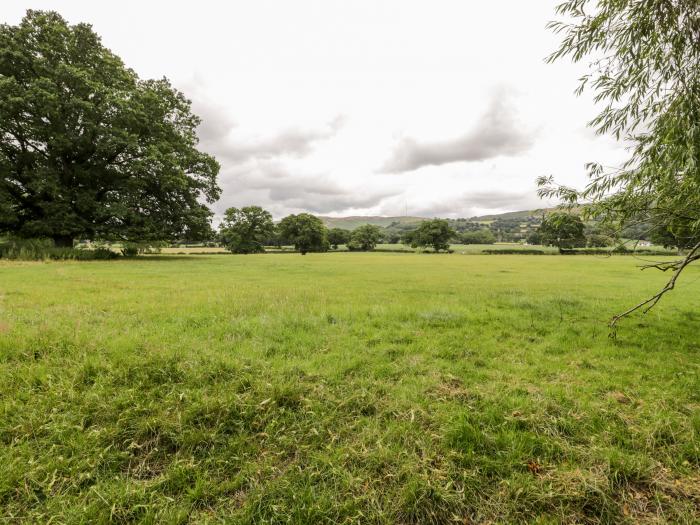 Lower Gardener's Cottage in Llandyrnog near Denbigh, Denbighshire. Off-road parking. Hot tub. Pets.