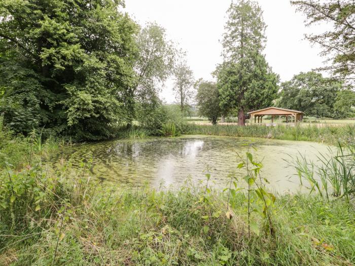 Upper Gardener's Cottage in Llandyrnog near Denbigh, Denbighshire. Off-road parking. Hot tub. Pets.