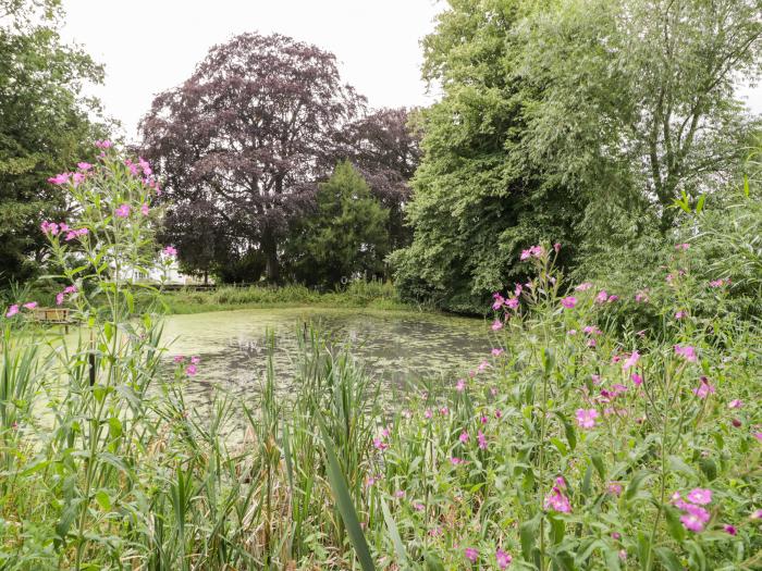 Upper Gardener's Cottage in Llandyrnog near Denbigh, Denbighshire. Off-road parking. Hot tub. Pets.