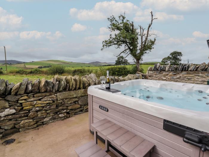 Rhos Las, Cerrigydrudion, Conwy. Four bedrooms. Contemporary. Countryside views. Patio with hot tub.