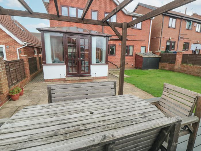 23 Carvers Court, Brotton, North Yorkshire. Four bedrooms. Enclosed garden with furniture & decking.