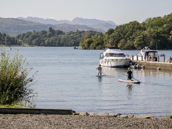 The Lodge, is in Ambleside, Cumbria. In Lake District National Park. Off-road parking. Near a lake.