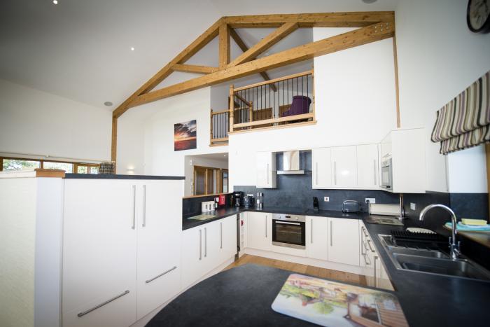 Atlas, Cawdor, Highlands Four-bedroom log cabin with rural views. Family-friendly. Hot tub and sauna