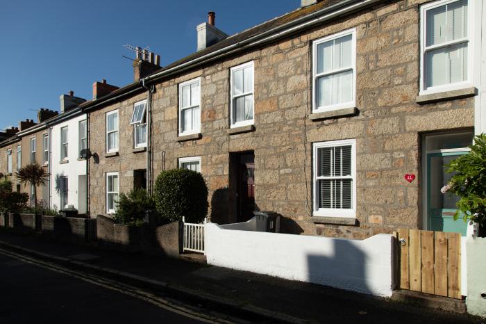 11 Belgravia Street, Penzance, Cornwall. Mid-terrace. Enclosed courtyard. Woodburning stove. 3 beds.