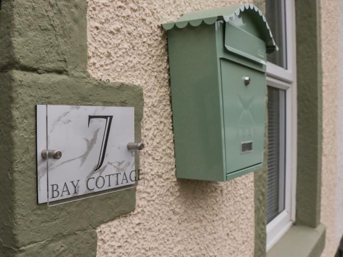 Bay Cottage No 7 in Morecambe, Lancashire. Two-bedroom home near amenities and beach. Hot tub. Pets.