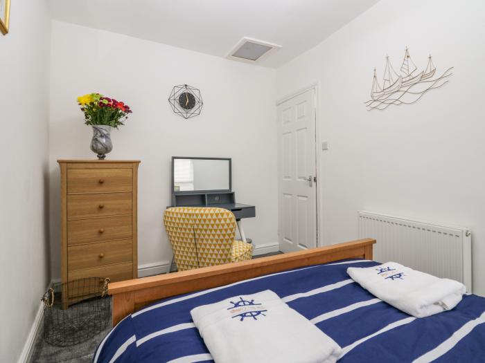 Bay Cottage No 7 in Morecambe, Lancashire. Two-bedroom home near amenities and beach. Hot tub. Pets.