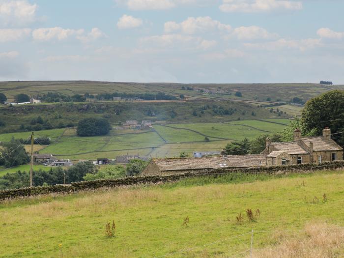 Marsh Cottage in Oxenhope, West Yorkshire. Two-bedroom cottage enjoying rural views. Private garden.