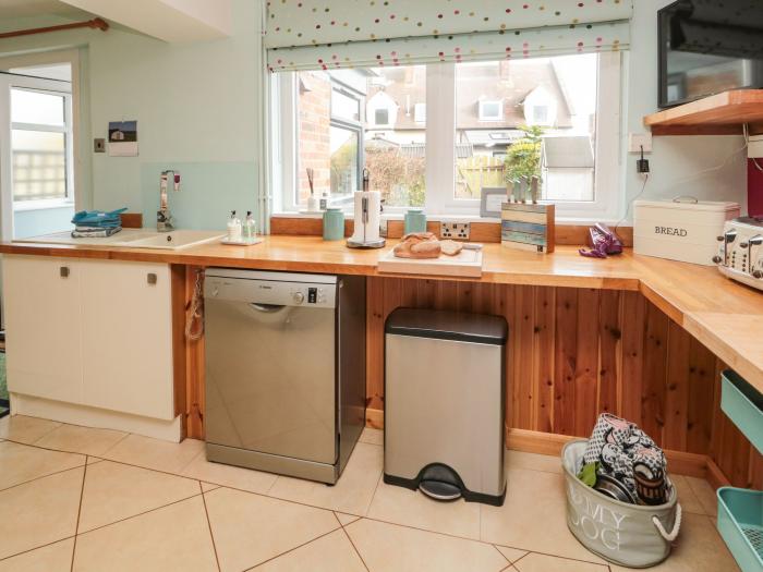 Coast Cottage, Bamburgh, Northumberland. Two-bedroom home resting near the beach and amenities. Pets