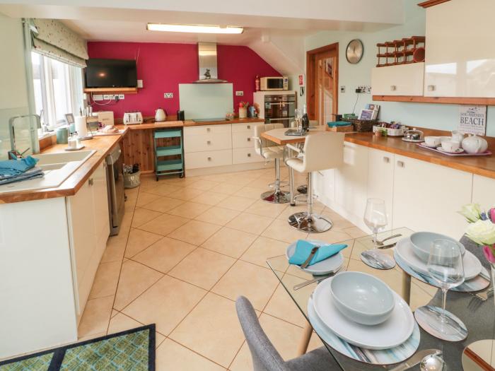 Coast Cottage, Bamburgh, Northumberland. Two-bedroom home resting near the beach and amenities. Pets