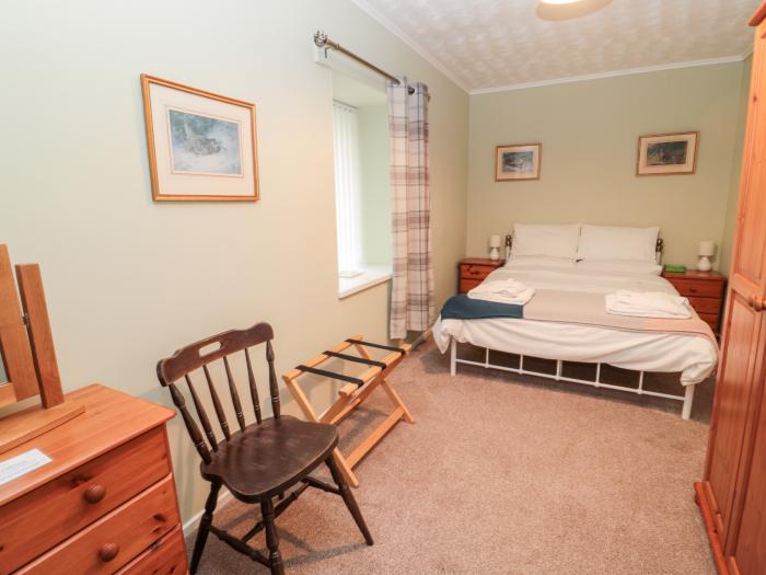 Golden Fleece Cottage in Lowick, Northumberland. Two-bedroom bungalow resting near amenities. Family