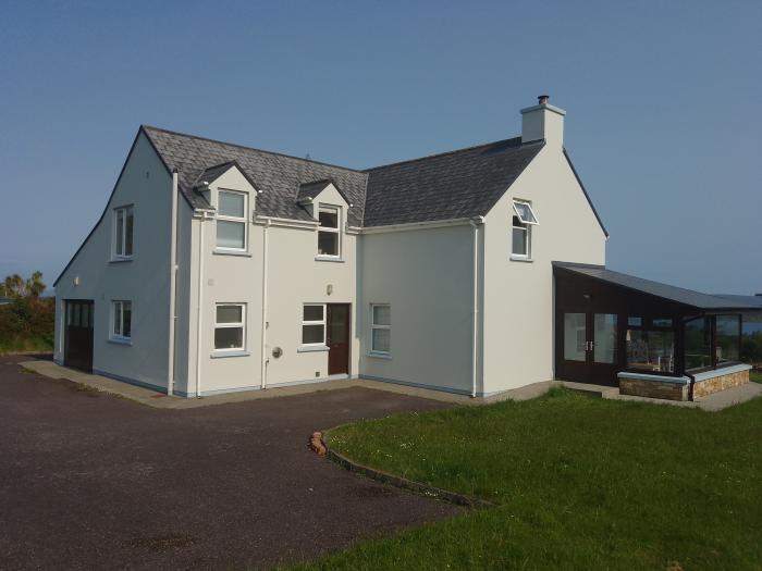 Casey House is near Castletownbere, County Cork. Four-bedroom home enjoying sea views. Large. Garden