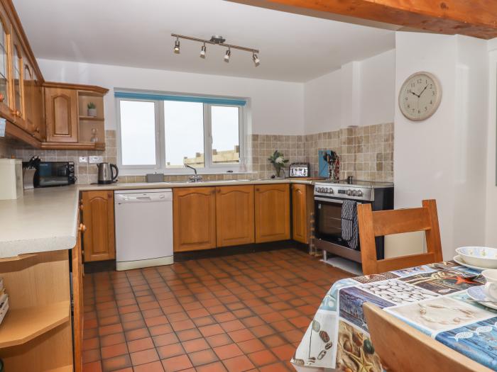 Halls Farm is near Poughill, Cornwall. Close to amenities and beach. Open fire. Smart TV. Sea views.