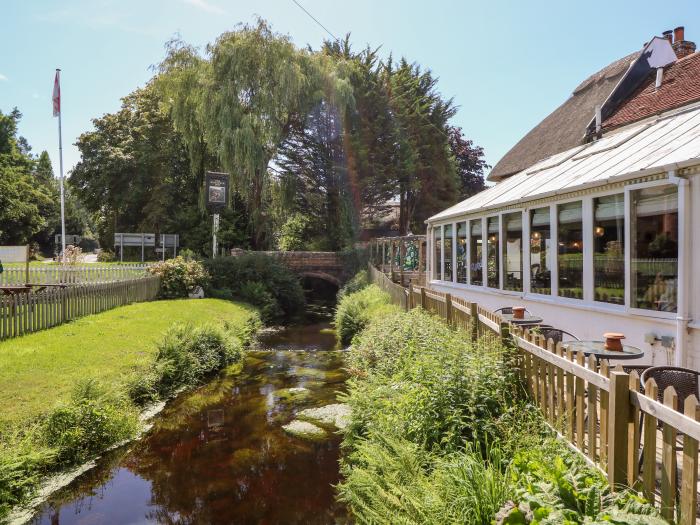 Northern Byre rests in Sopley, Hampshire. Four-bedroom barn conversion, resting near amenities. Pets