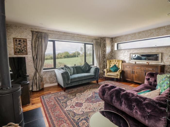 Thornhill is nr Enniscorthy, County Wexford. Four-bedroom home with rural views. Large garden. Pets.