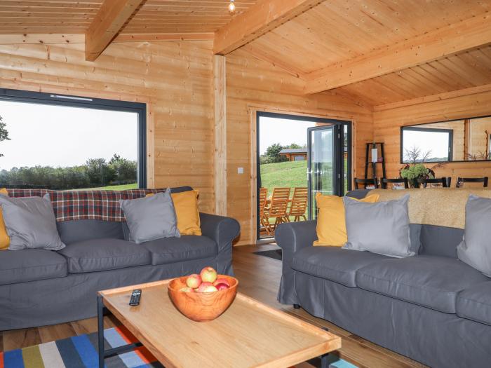 Bluebell Lodge in Hittisleigh, Devon. Three bedrooms. Norwegian design. Rural location & woodburner.