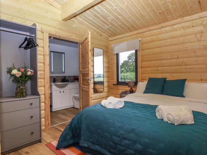 Bluebell Lodge in Hittisleigh, Devon. Three bedrooms. Norwegian design. Rural location & woodburner.