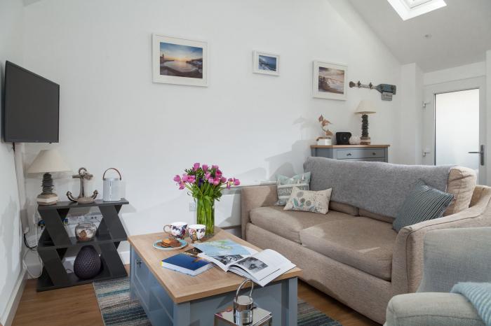The Loft is in Porthleven, Cornwall. One-bedroom bolthole, ideal for couples. Sea views. Near beach.