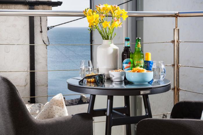 The Loft is in Porthleven, Cornwall. One-bedroom bolthole, ideal for couples. Sea views. Near beach.