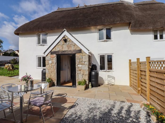 2 Coldeast Cottages, is near Newton Abbot, Devon. Two-bedroom, Grade II listed cottage. Rural views.