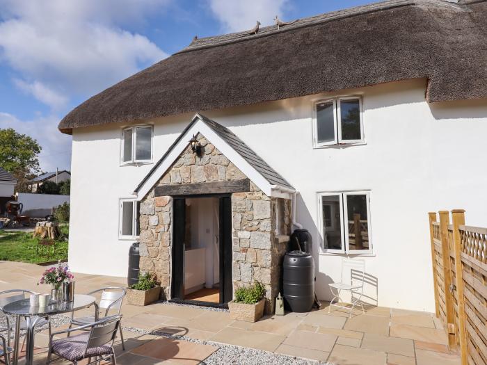 2 Coldeast Cottages, is near Newton Abbot, Devon. Two-bedroom, Grade II listed cottage. Rural views.