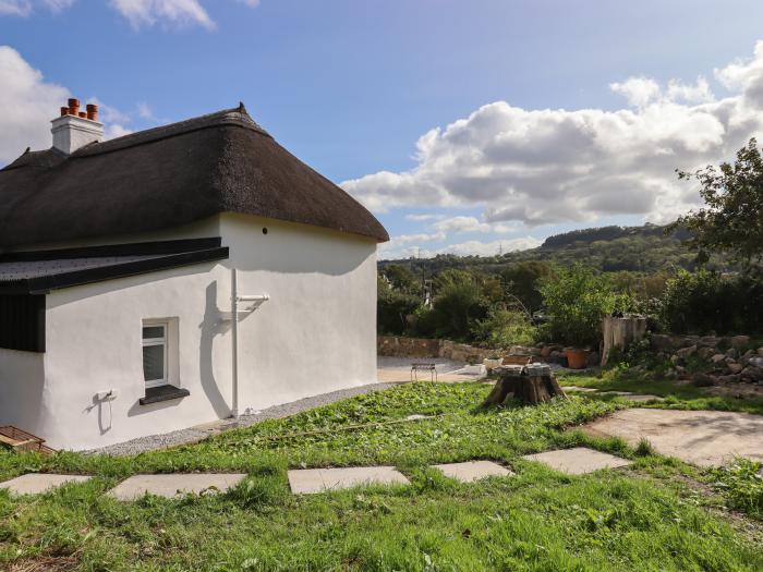 2 Coldeast Cottages, is near Newton Abbot, Devon. Two-bedroom, Grade II listed cottage. Rural views.